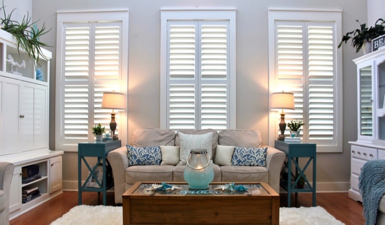 Bluff City designer home with faux wood shutters 